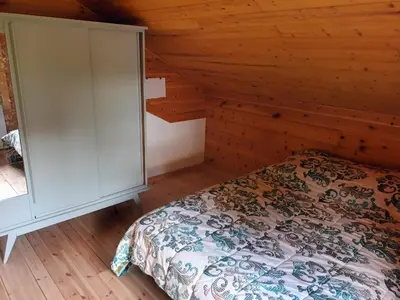 Un ou plusieurs lits dans un hébergement de l'établissement Chalet L 'instant Géromois