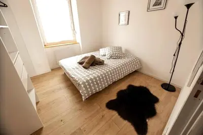 Un ou plusieurs lits dans un hébergement de l'établissement ALMA BIG Bel Appartement Proche Gare Mulhouse