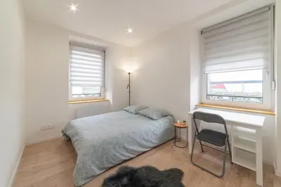 Un ou plusieurs lits dans un hébergement de l'établissement ALMA BIG Bel Appartement Proche Gare Mulhouse