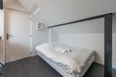 Un ou plusieurs lits dans un hébergement de l'établissement Studio G Quai de l Alma Mulhouse