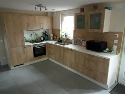 Cuisine ou kitchenette dans l'établissement Maison de vacances centre Alsace
