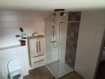 Salle de bains dans l'établissement Maison de vacances centre Alsace