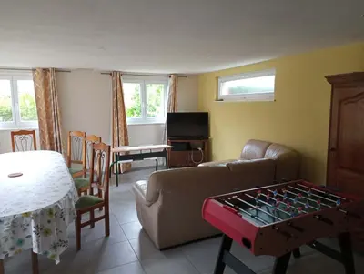 Coin salon dans l'établissement Maison de vacances centre Alsace