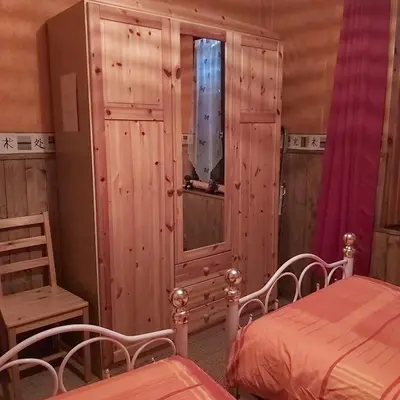 Un ou plusieurs lits dans un hébergement de l'établissement appartement chez Chantal RDC 60m2 GERARDMER