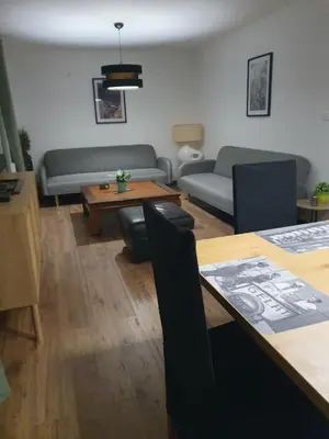 Coin salon dans l'établissement Grande maison proche Colmar