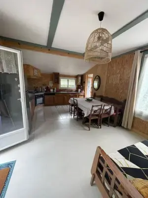Cuisine ou kitchenette dans l'établissement chalet cosy au calme