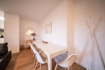 Coin salon dans l'établissement Le Bâle 92A Appartement 6 Pers Parking Privé