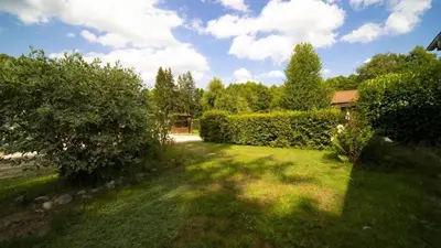 Jardin de l'établissement Chez Dom & Oli camping GINA PARK