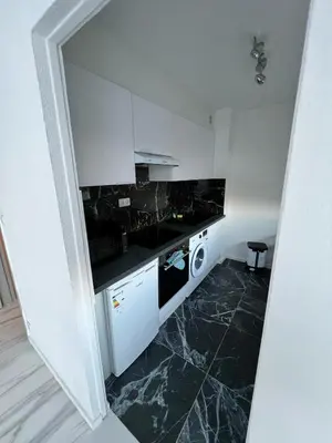 Cuisine ou kitchenette dans l'établissement Charmant T2 Haut Standing