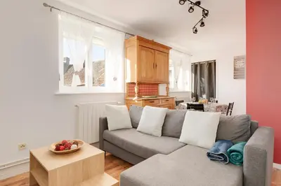 Coin salon dans l'établissement Aux 4 saisons - Proche de Gérardmer
