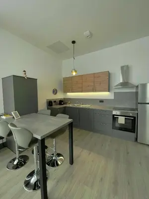 Cuisine ou kitchenette dans l'établissement Espace détente Gaudi