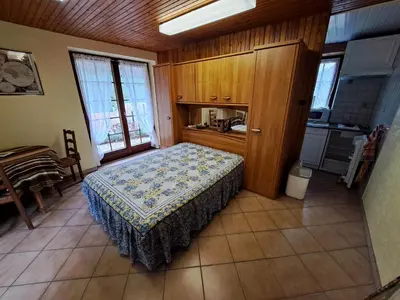 Cuisine ou kitchenette dans l'établissement Studio CHAMPETRE F1