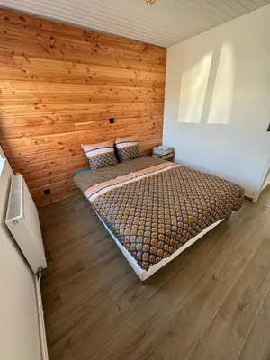 Un ou plusieurs lits dans un hébergement de l'établissement Maison 8 personnes 4 Chambres Doubles - Piscine