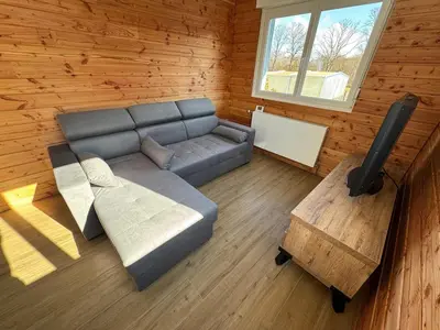 Coin salon dans l'établissement Maison 8 personnes 4 Chambres Doubles - Piscine