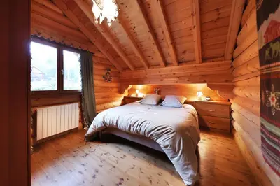Un ou plusieurs lits dans un hébergement de l'établissement Chalet Le Petit Pré
