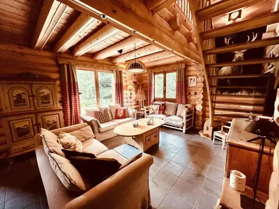 Coin salon dans l'établissement Chalet Le Petit Pré