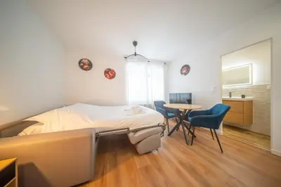 Un ou plusieurs lits dans un hébergement de l'établissement Frontiere Suites 6 Saint-Louis Proche Bale