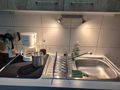 Cuisine ou kitchenette dans l'établissement L'Arquebuse