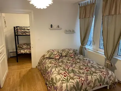 Un ou plusieurs lits dans un hébergement de l'établissement Colmar Centre renovated cottage 4 people - terrace