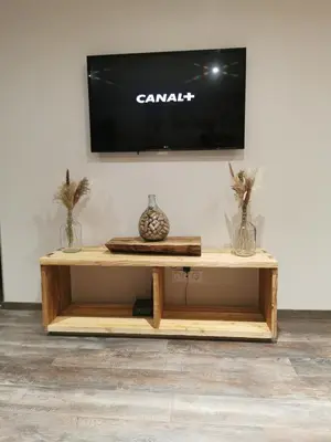 Télévision ou salle de divertissement dans l'établissement Le Cocon de Litia