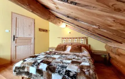 Un ou plusieurs lits dans un hébergement de l'établissement Chalet mishka