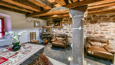 Coin salon dans l'établissement Gite de la Porte des Pucelles