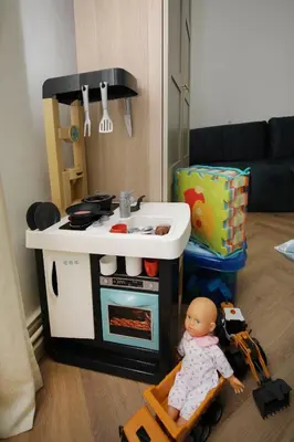 Cuisine ou kitchenette dans l'établissement LE LYNX HAUSSMANIEN appartement tout confort, climatisé avec parking privé, à deux pas du centre