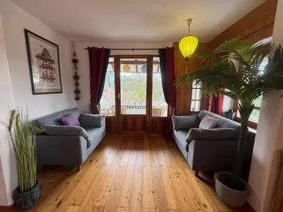 Coin salon dans l'établissement Gîte au Manoir des Sens - Escapade insolite aux parfums et couleurs d Asie