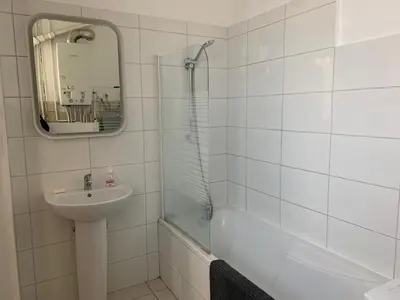Salle de bains dans l'établissement Grand appartement proche centre et tram