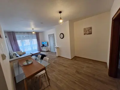 Télévision ou salle de divertissement dans l'établissement Colmar Nest