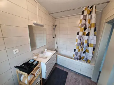 Salle de bains dans l'établissement Colmar Nest