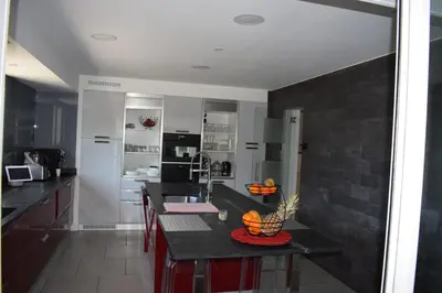 Cuisine ou kitchenette dans l'établissement Villa Rixheim