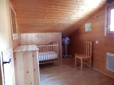 Un ou plusieurs lits dans un hébergement de l'établissement Chalet des FURETS