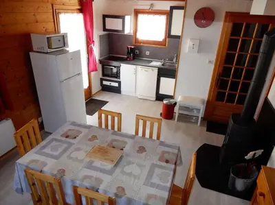 Cuisine ou kitchenette dans l'établissement Chalet des FURETS