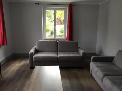Coin salon dans l'établissement Les Coteaux
