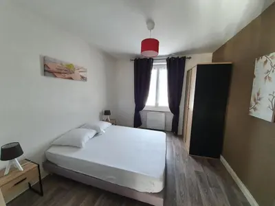 Un ou plusieurs lits dans un hébergement de l'établissement Chez Carine et Jonathan 1er etage