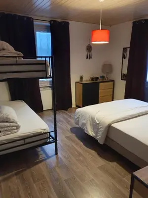 Un ou plusieurs lits dans un hébergement de l'établissement Chez Carine et Jonathan 1er etage