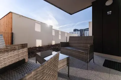 Balcon ou terrasse dans l'établissement Les Jardins de la Semm - Parking et Jardin