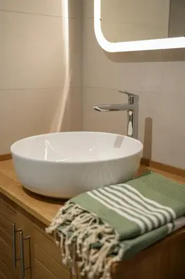 Salle de bains dans l'établissement Les Hauts de Bergheim