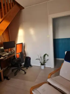 Coin salon dans l'établissement Chambre privée, parking gratuit
