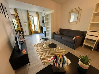 Coin salon dans l'établissement Le Salon Doré Apartment