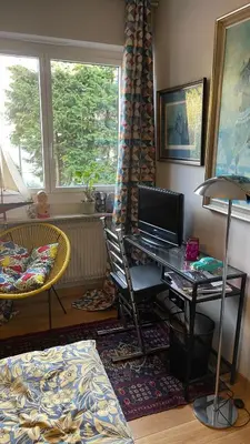 Télévision ou salle de divertissement dans l'établissement La galerie