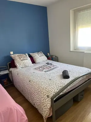 Un ou plusieurs lits dans un hébergement de l'établissement Les chambres de Marie