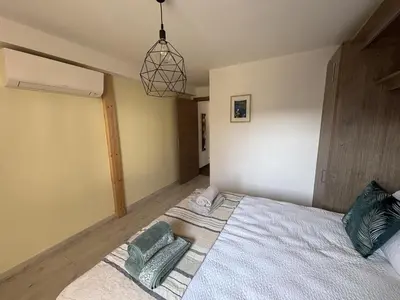 Un ou plusieurs lits dans un hébergement de l'établissement Sweet Escape et Spa