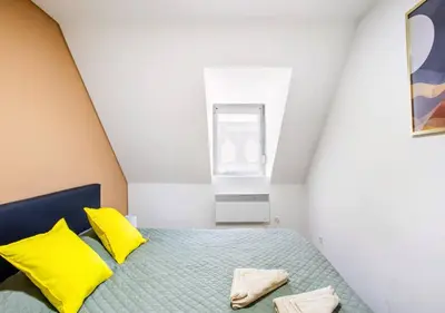 Un ou plusieurs lits dans un hébergement de l'établissement Sienna - Calme et bien-être au coeur de Mulhouse