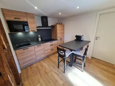 Cuisine ou kitchenette dans l'établissement L'Ecrin du Rempart