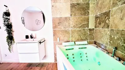 Salle de bains dans l'établissement T1 Nature et Balnéothérapie