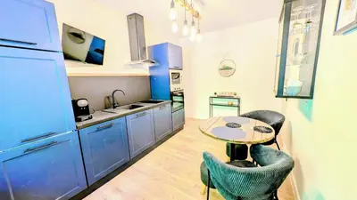 Cuisine ou kitchenette dans l'établissement T1 Nature et Balnéothérapie