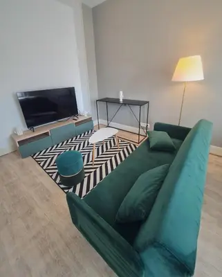 Télévision ou salle de divertissement dans l'établissement Lauch & Bretzel