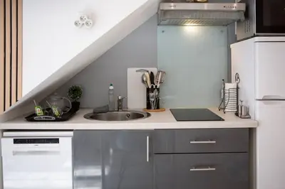 Cuisine ou kitchenette dans l'établissement Le Kelly - Hyper Centre Mulhouse